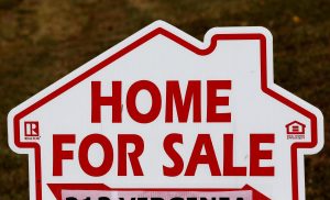 Compass_Zillow_86854 The law in most states requires home sellers to be upfront about certain things, and a difficult neighbor can occasionally fall into that category. (Gerry Broome/AP file)