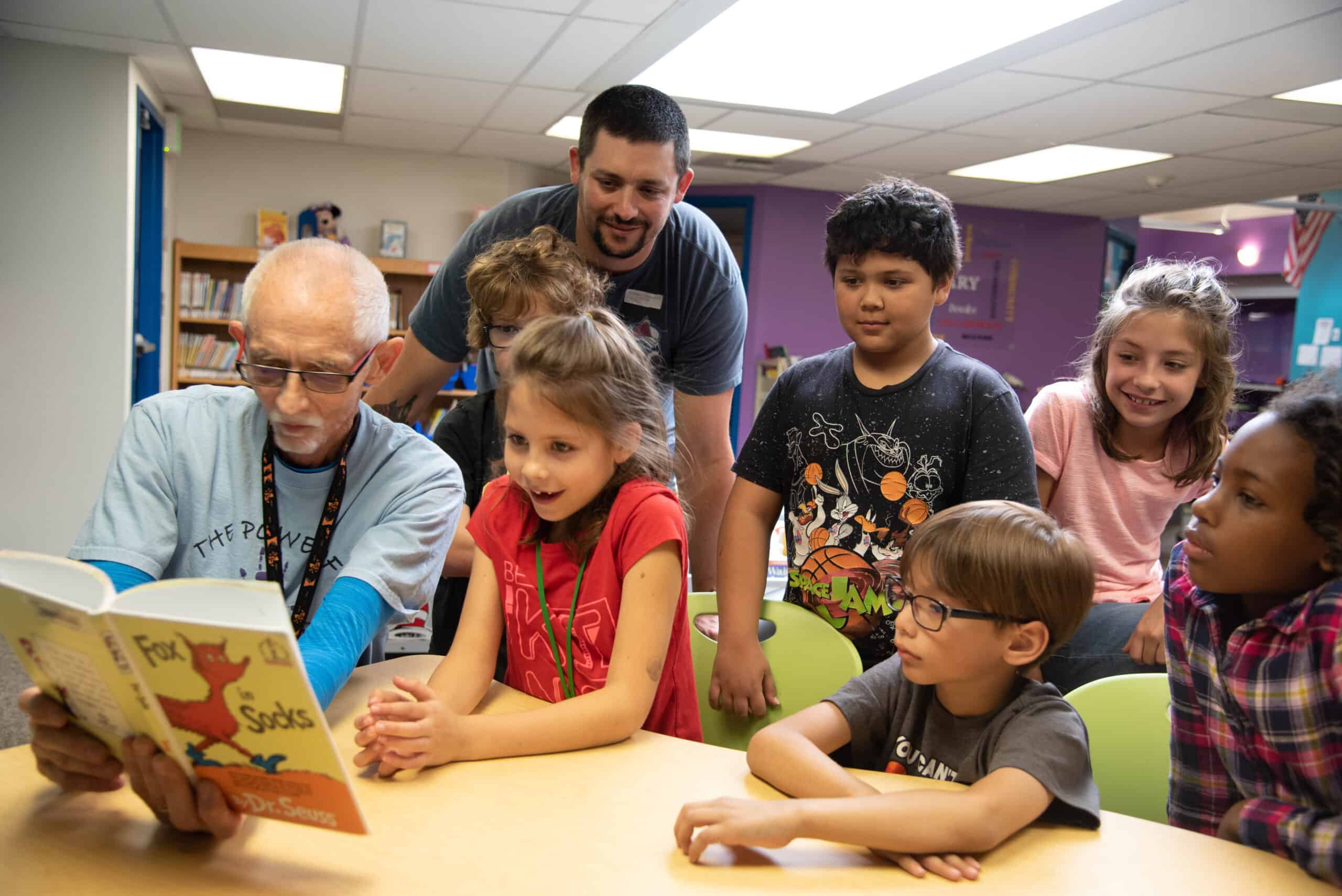 Volunteers read to students at Burlington Elementary