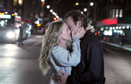 Sarah Jessica Parker and John Corbett share a kiss on And Just Like That set