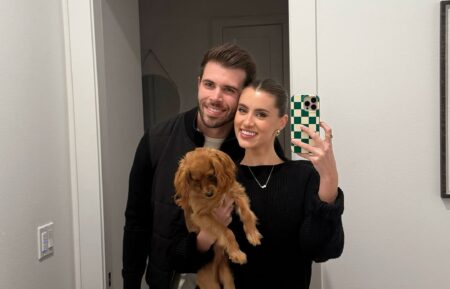 Zach Shallcross and Kaity Biggar with their dog